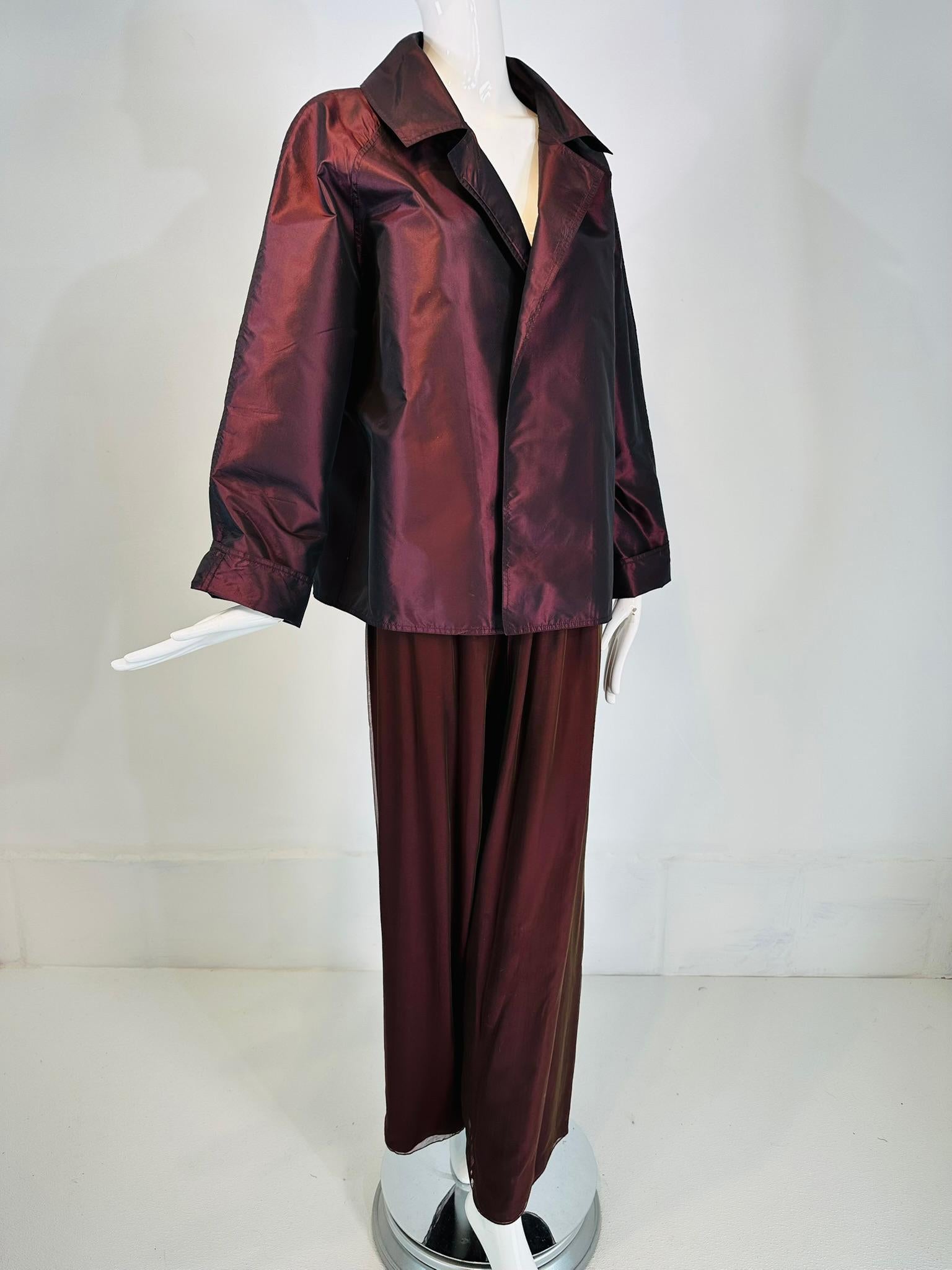 Zoran 2pc. raisin paper silk & shot silk chiffon jacket & pant set. Gorgeous colour in deep gemlike tones. Long raglan sleeve jacket open at the front with a wing collar, long full straight raglan sleeves with turn back cuffs, lightweight silk paper
