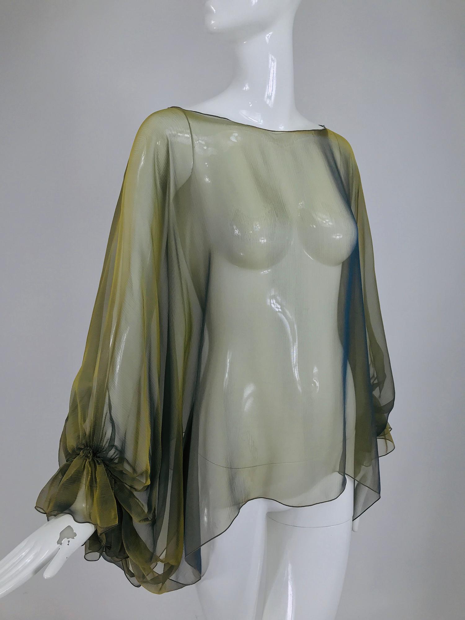 Zoran changeable silk poet sleeve layering top from the 1990s. Light as air silk in moss green with electric blue flashes, this slip on top has beautiful full sleeves with deep gathered ruffle cuffs, it's perfect for layering over just about