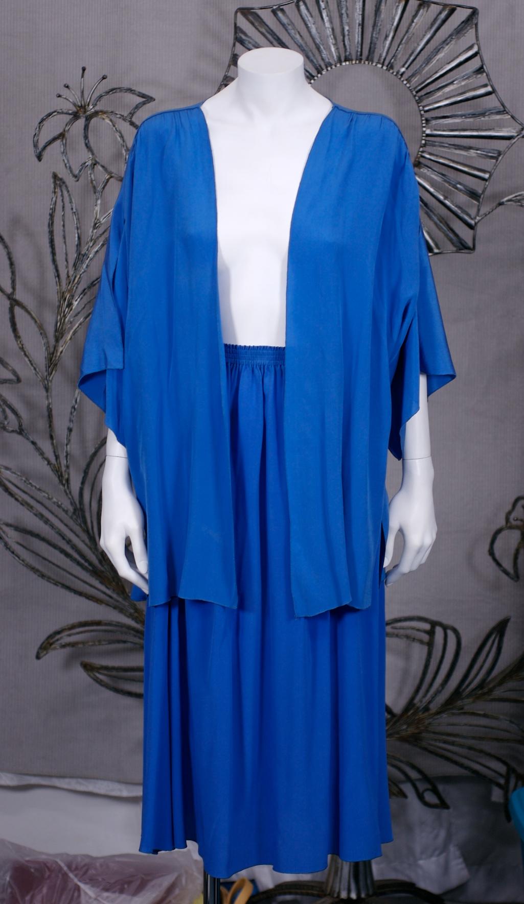 Zoran Easy Blue Silk Crepe Ensemble. 2 easy pieces composed of an open kimono with slashed sleeves and simple elastic waist skirt. 
Zoran's aesthetic of easy to wear pieces became his iconic style. Ensemble can be worn in various ways. 1990's USA.