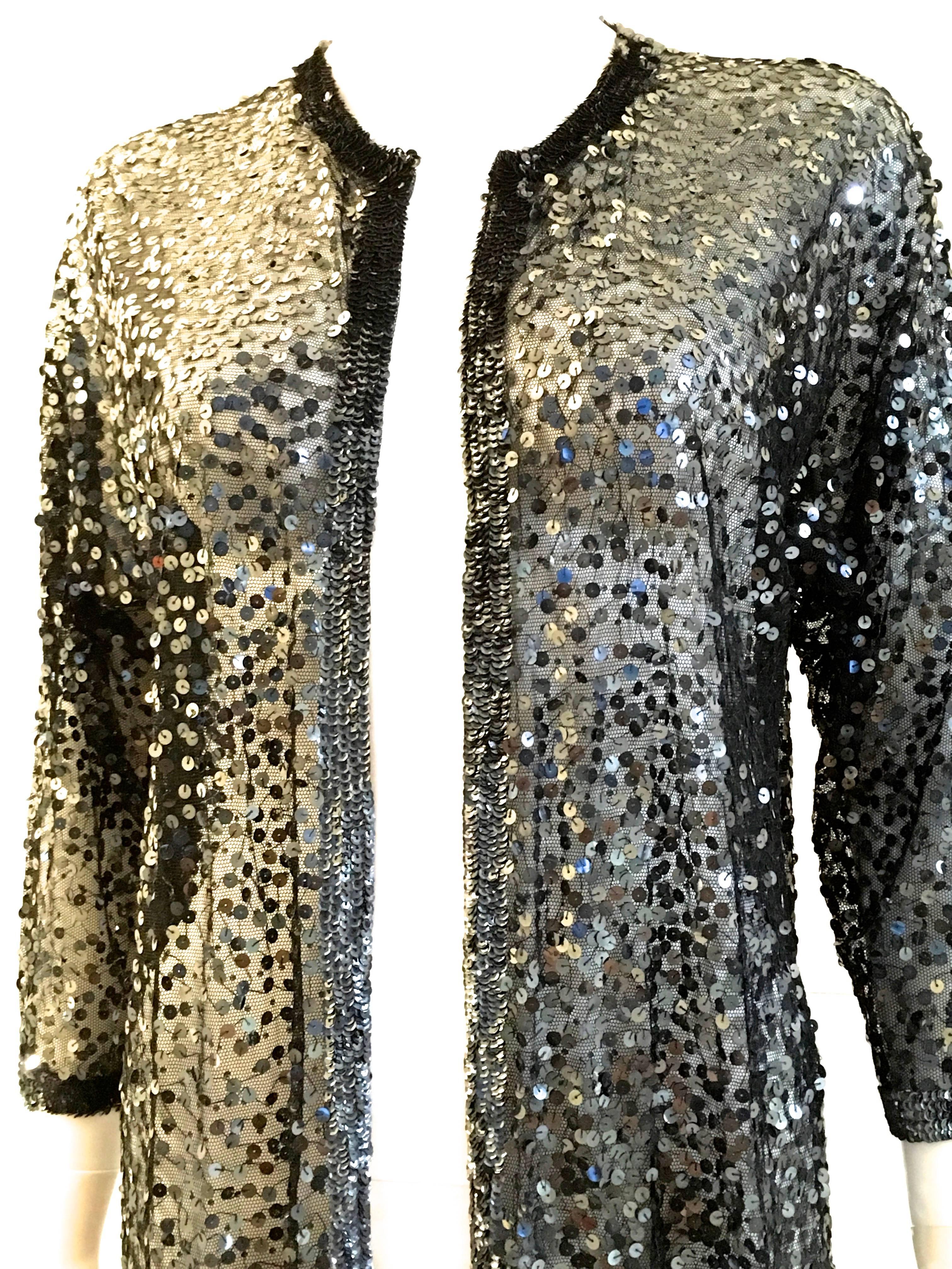 Presented here is a beautiful sequined jacket by Zoran. As with most Zoran, it is usually a one size fits all because it is completely opened on the front. It fits anyone from a size 0 to a size 10 depending on how loose or tight you want to wear