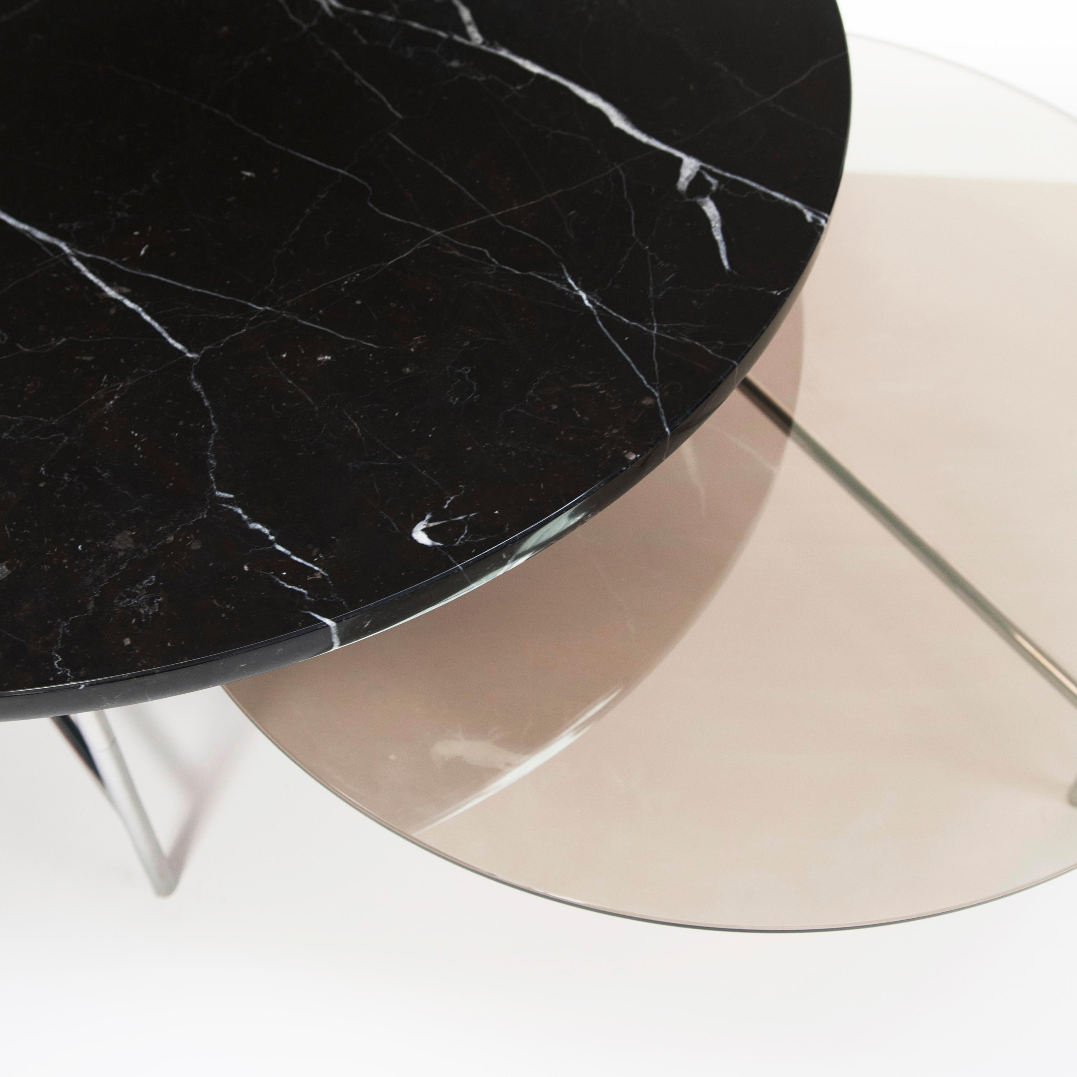 Zorro is a minimalist yet graphical coffee table. The masked hero signature inspired the ingenious Z structure which supports a duo of overlapping round tabletops giving a sense of lightness to this simple and elegant
piece.
The design plays with