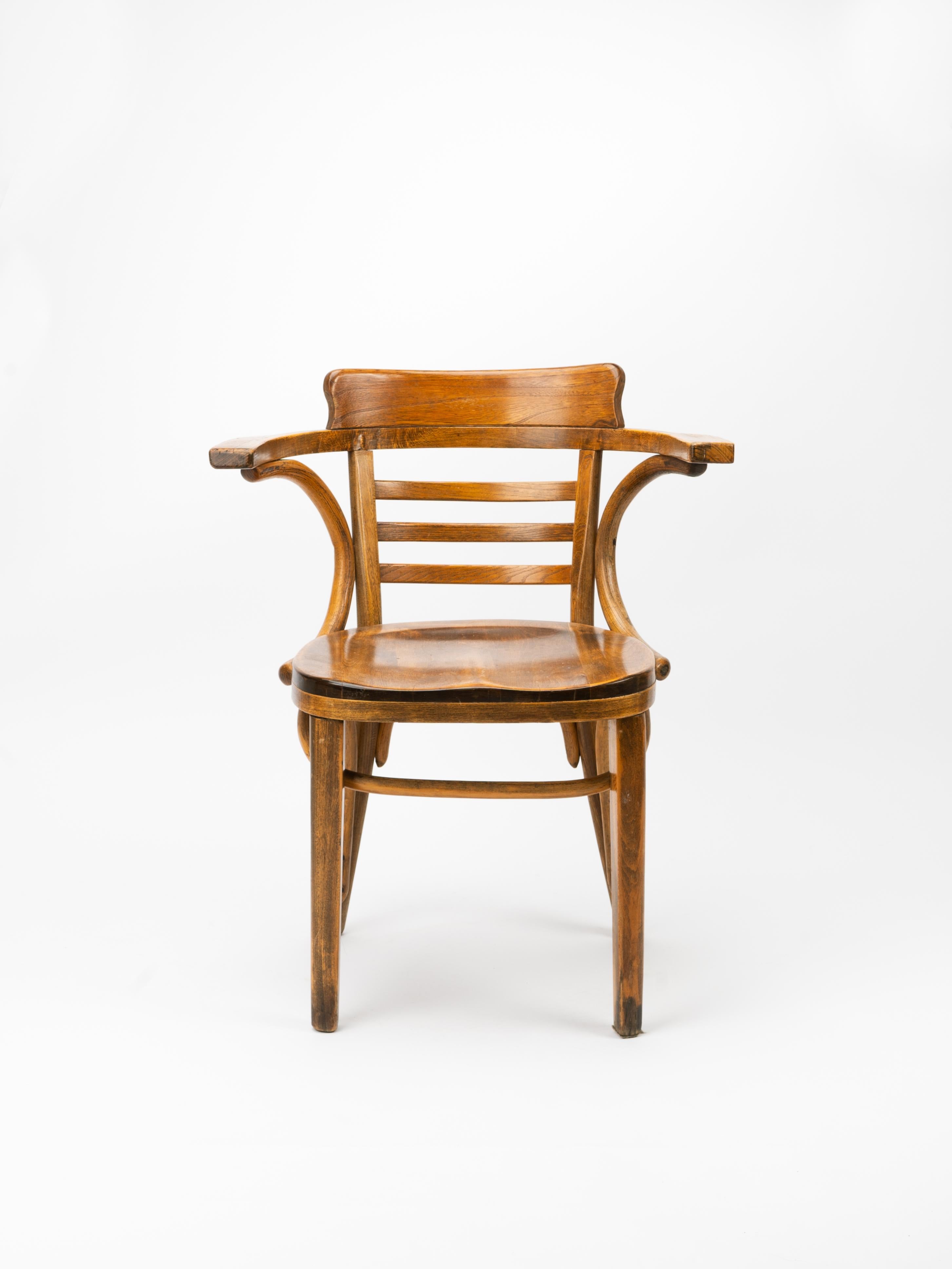 Bentwood furniture came to prominence in the early 1900s, and was a staple in cafes and restaurants in Europe. This is a bentwood armchair, designed by ZPM Radomsko in Poland and produced for Thonet. The amazing bentwood construction introduces