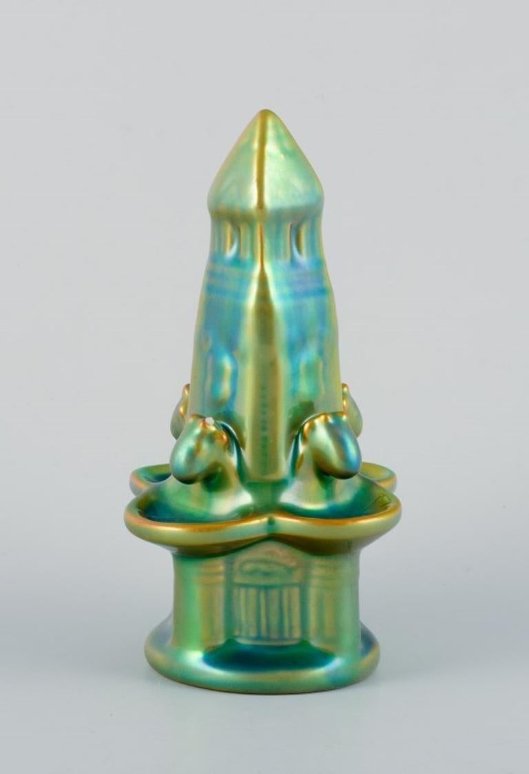 Zsolnay, Hungary, ceramic fountain sculpture with eosin glaze.
20th century.
In perfect condition.
Marked.
Dimensions: H 14.0 cm x D 6.0 cm.

