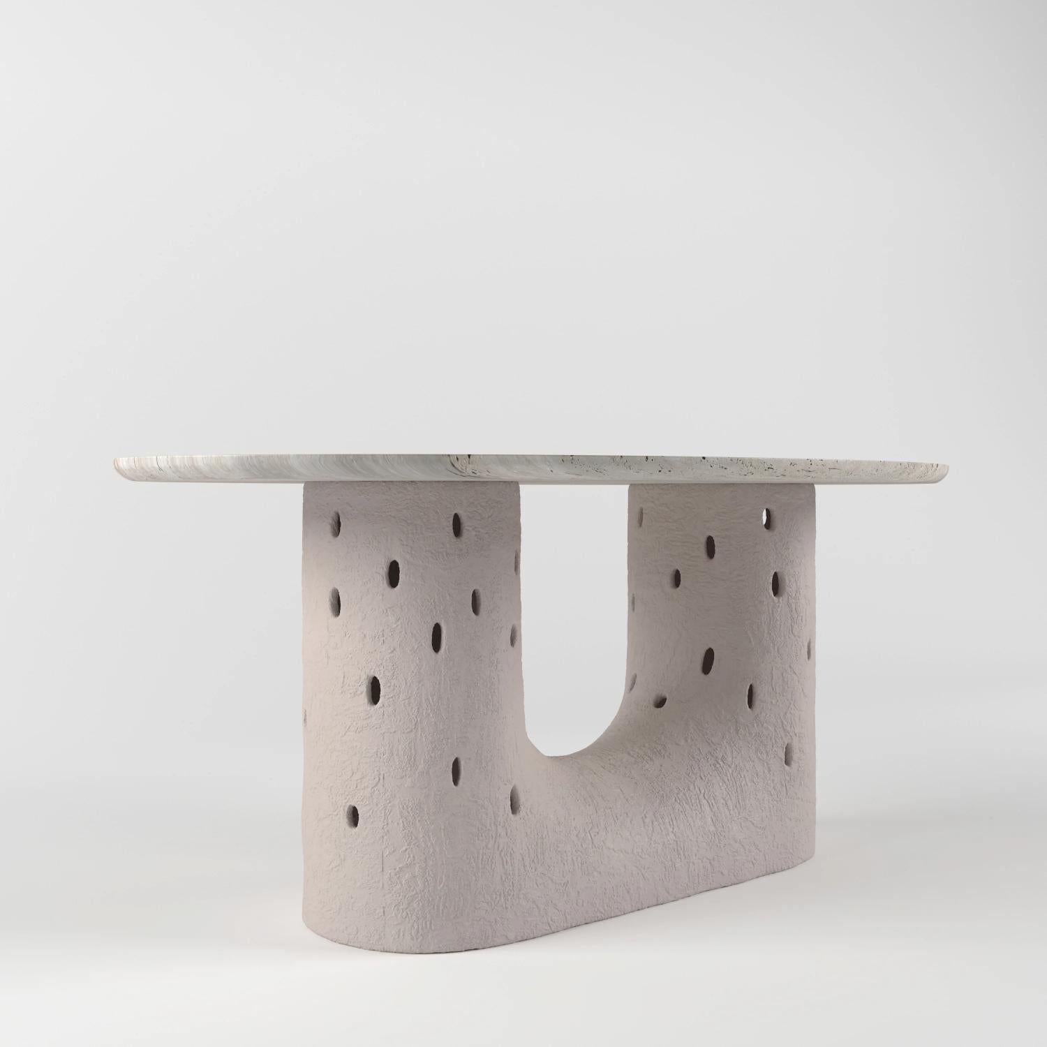 Ztista oval table by Faina
Design: Victoriya Yakusha.
Dimensions: W 170 x D 110 cm x H 74 cm
Material: Upcycled steel frame and live ZTISTA Material - a blend of cellulose, clay, flax fiber wood chips, biopolymer cover. Wooden table top / ash.
