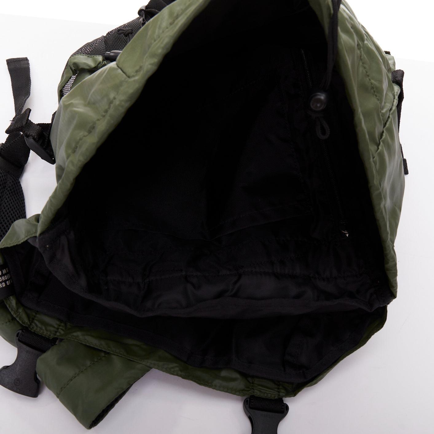 ZUCCA mochila verde de nailon negro con hebillas de plástico y solapa de carga con correas en venta 3