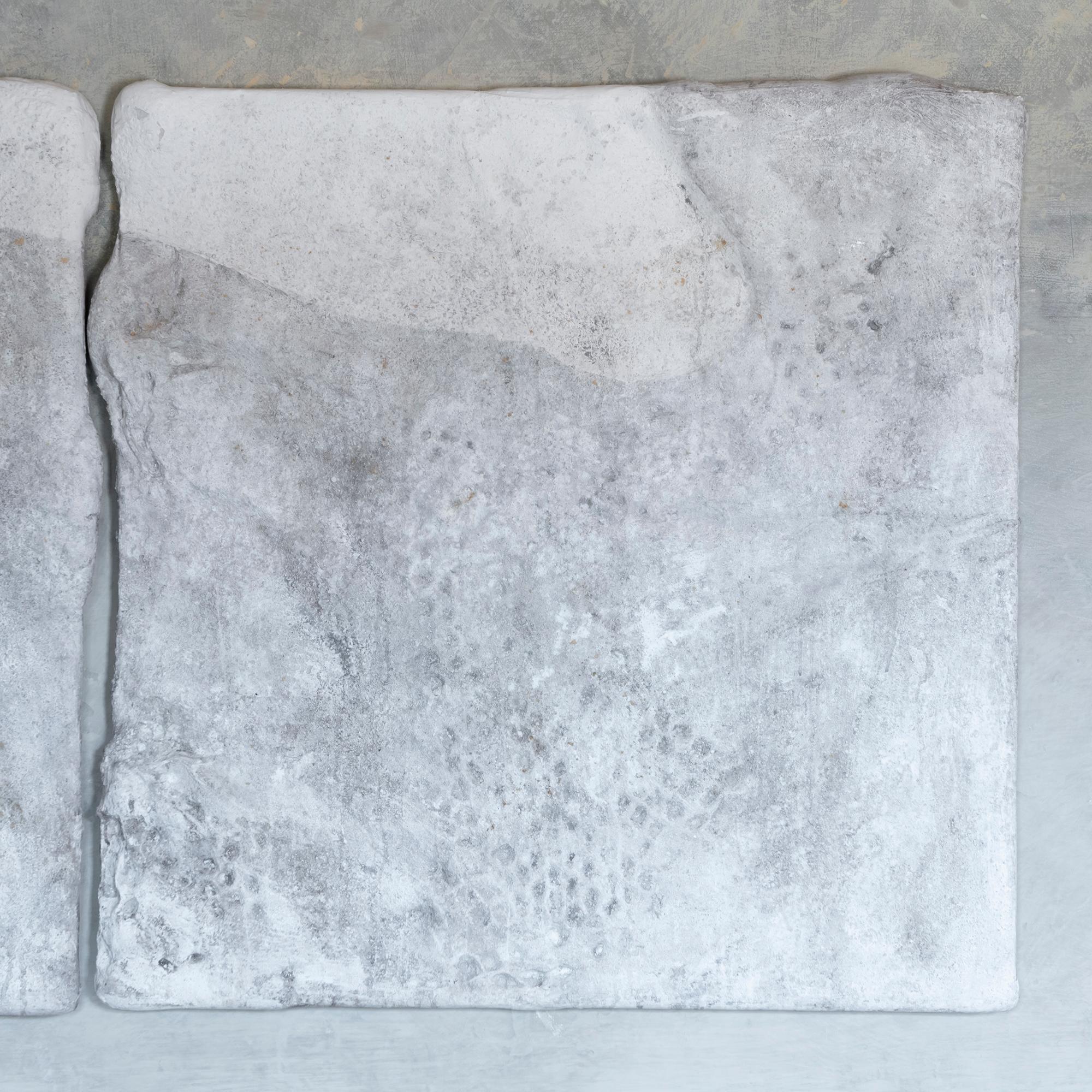 Wall art diptych realized with canvas over foam rubber, honey comb cardboard and wood frame, plaster and white and light grey water paint, measure of each panel cm 104 x 7 x H. 104, by Matteo Giampaglia, Italy, 2020.