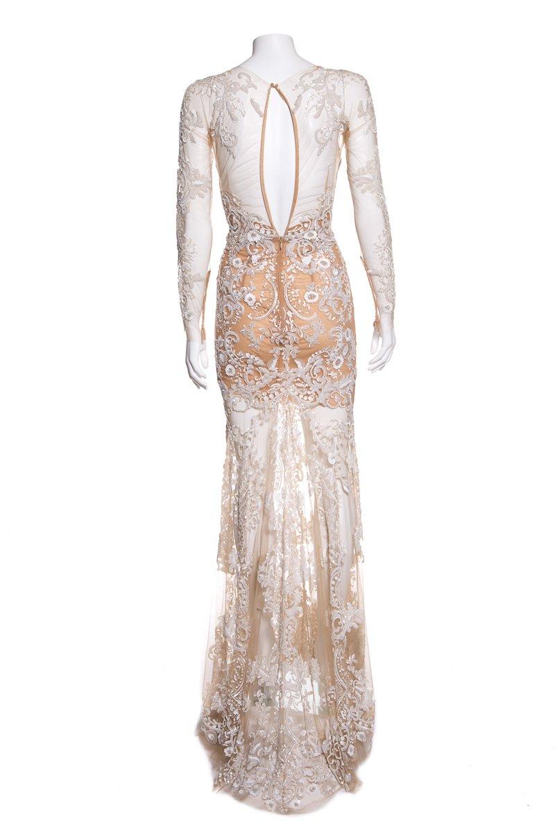 Zuhair Murad long sleeve, mesh gown with sequin and beaded embellishment throughout and concealed back zip closure.
This item is previously worn with no major signs of wear.
Fabric: Silk/Polyamide
 
Size 4
 
Bust: 30