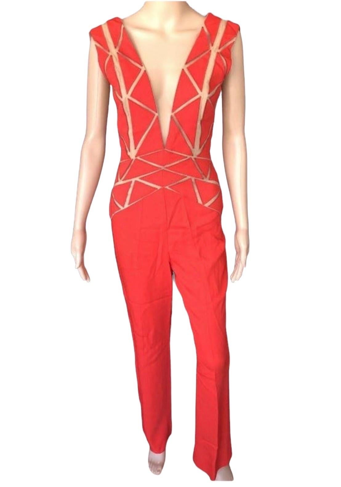 Zuhair Murad Resort 2015 Runway Plunged Sheer Tulle Cutout Red Romper Jumpsuit IT 40 

PLEASE NOTE THIS LISTING IS FOR THE JUMPSUIT IN THE RED COLOR.

Zuhair Murad sleeveless high-rise wide-leg jumpsuit featuring illusion V neckline, tulle inserts,