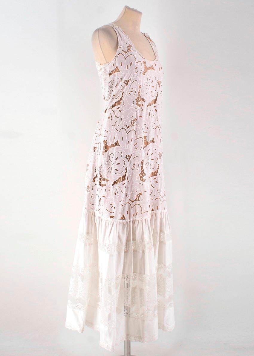 Zuhair Murad White Dropped Waist Dress

-Lace maxi dress with dropped waist
-Sheer lace dress with lining
-Side zip closure
-Scoop neckline

Please note, these items are pre-owned and may show signs of being stored even when unworn and unused. This