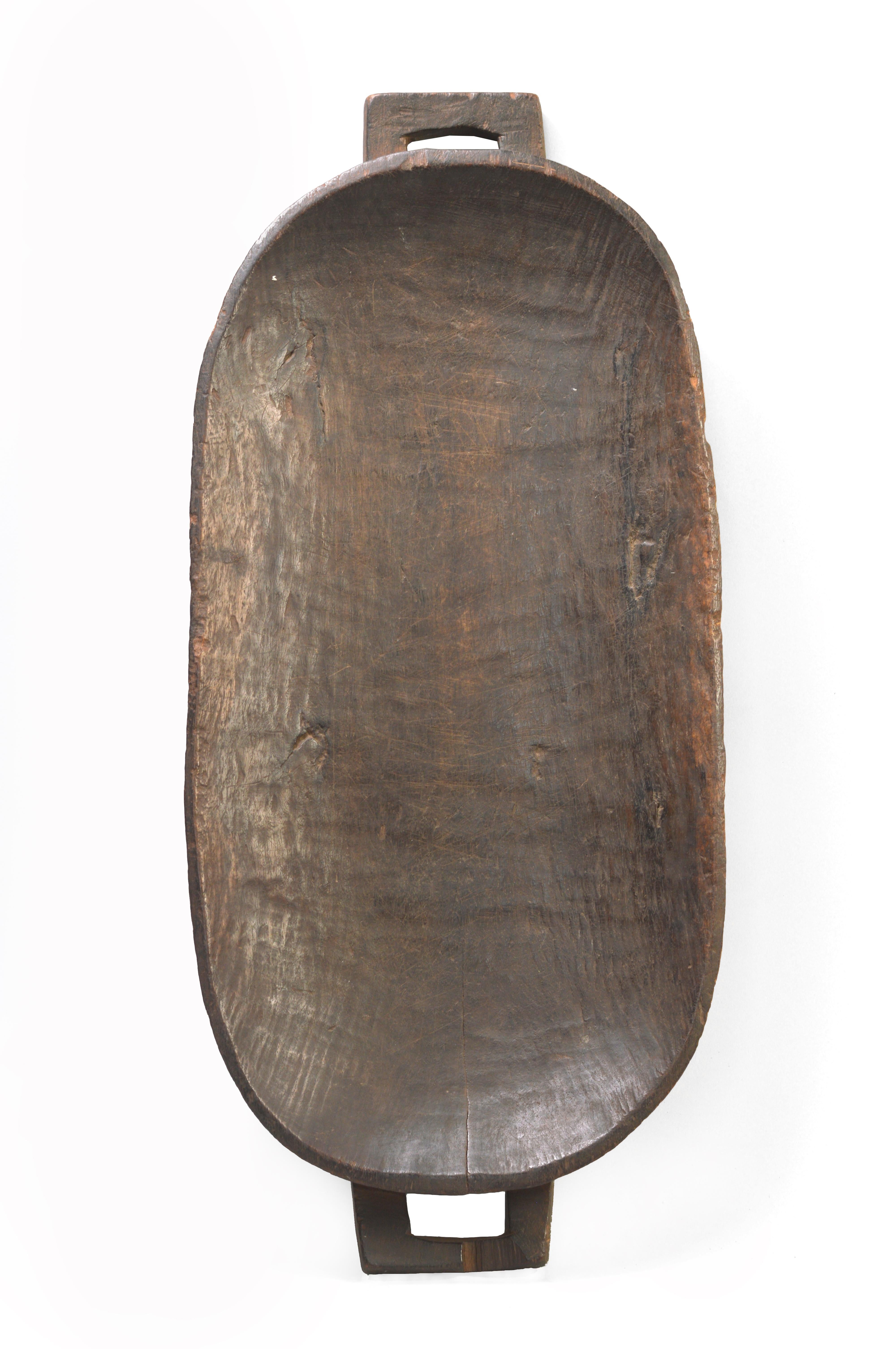 Zulu meat platters, called ugqoko in Zulu, are used at ceremonial gatherings for the carving and serving of meat derived from ritually-slaughtered livestock. The distinctive shapes of ugqoko and their decorative bosses (amasumpa) and other carved