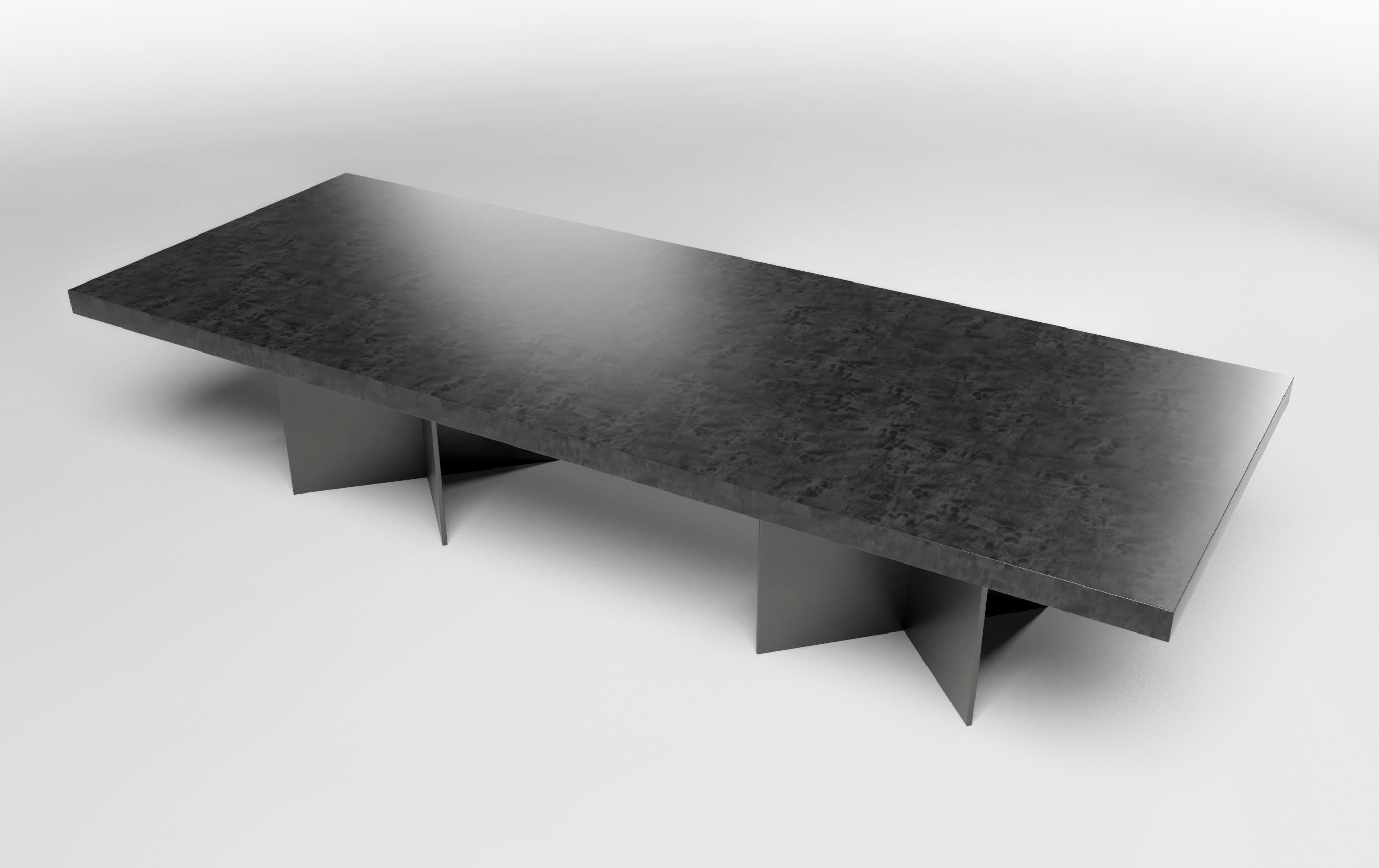 This beautifully designed iconic dining table utilizes a clean modern aesthetic and distinctive base to separate itself from the ordinary. Ortiz Milano's Creative Director Susan Hornbeak Ortiz has created a masterpiece from her new Ortiz Milano