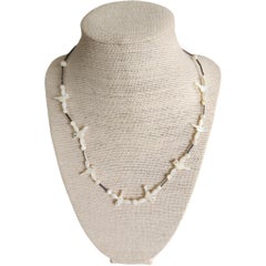 Zuni Carved Mother-of-Pearl Bird Fetish Necklace with Sterling Accents