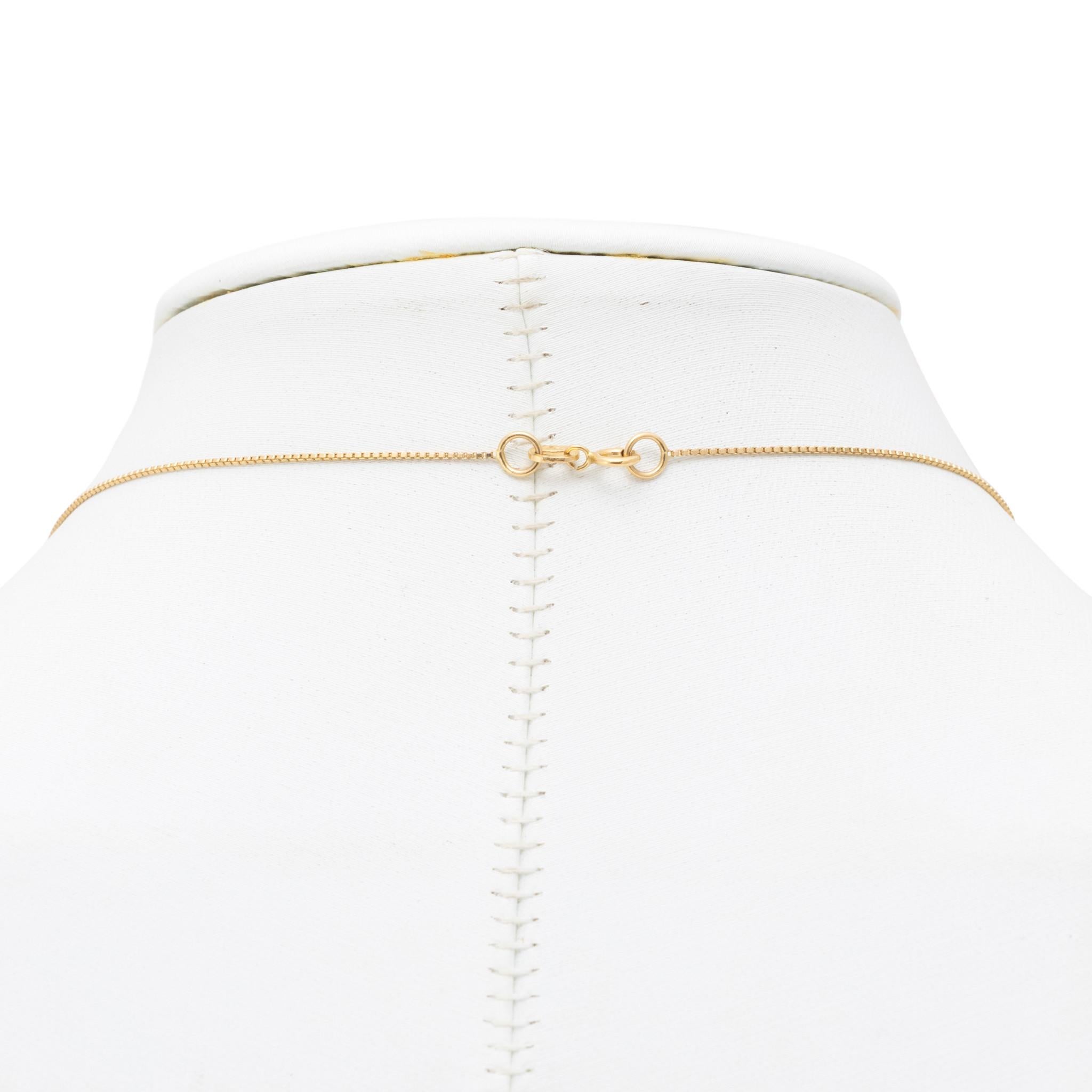 14k gold Zuni inlay pendant necklace. Pendant in shape of bear with lapis, coral, opal, and turquoise stones. Stamped 