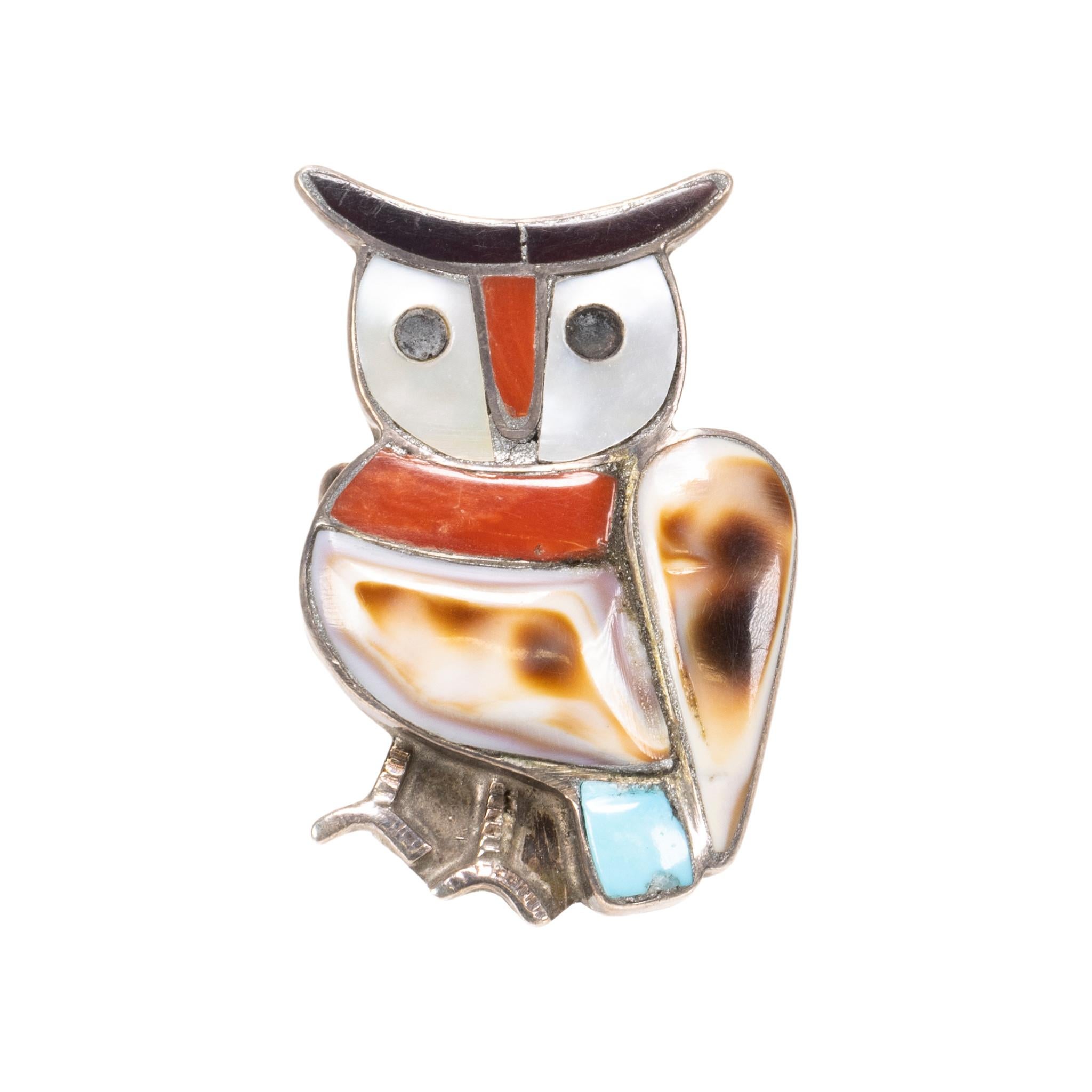 Zuni multi-stone and sterling silver owl necklace set with bracelet and ring. Necklace done in a squash blossom style with five inlay owls on either side of double-strand Navajo pearl chain. Decorative naja with owl in center hanging as pendant.