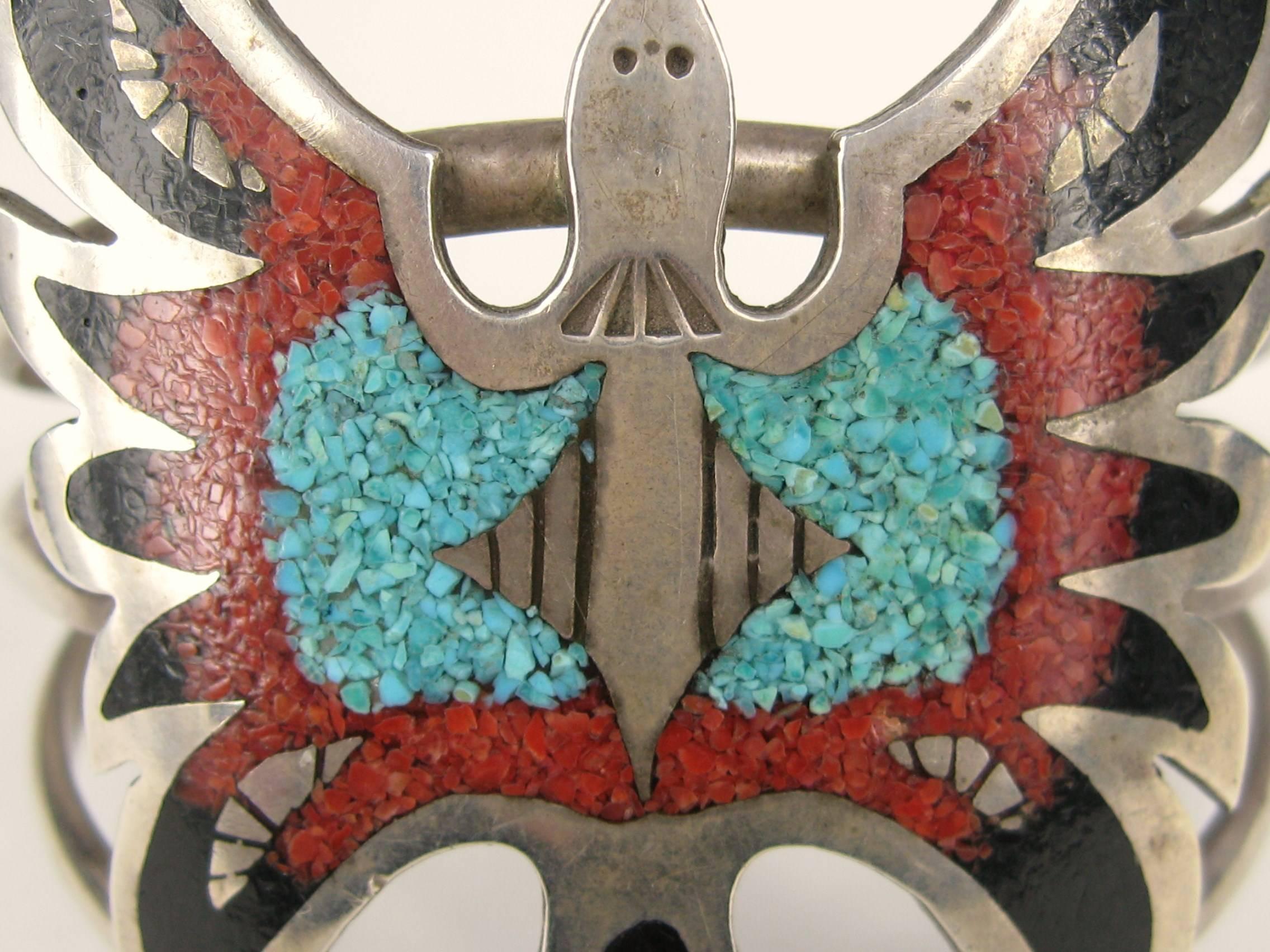 Large Zuni Bird in Flight Turquoise, Coral and Onyx Bracelet with a 3 ring bracelet. Stunning workmanship on this native American Bracelet. Measures 3.00 in x 2.00 in - 1.08in opening on cuff and it Will Fit a 7 in to 8 in  wrist. This is out of a