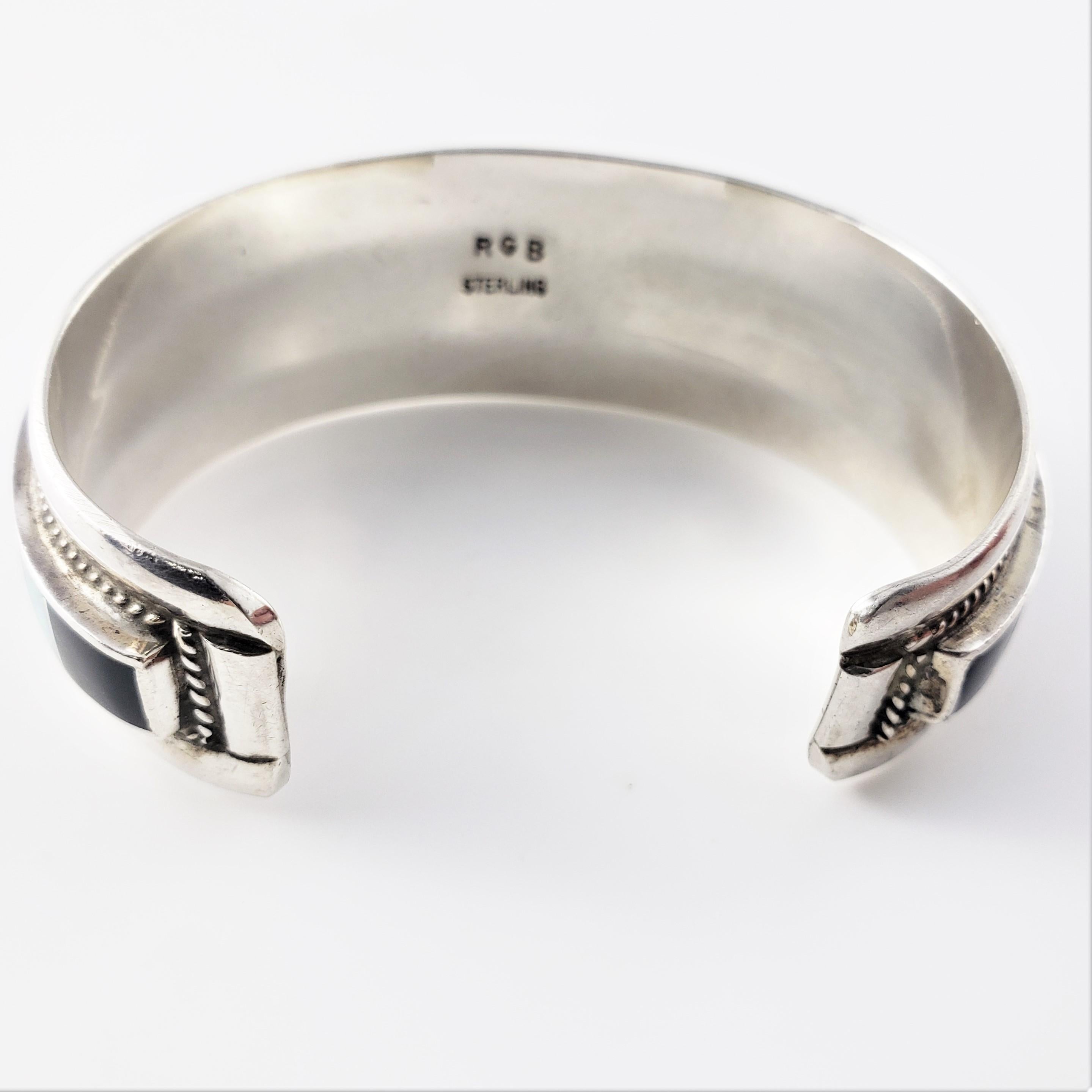 Manschettenarmband aus Sterlingsilber mit Onyx und Opal von Zuni Rickell & Glendora Booga Damen