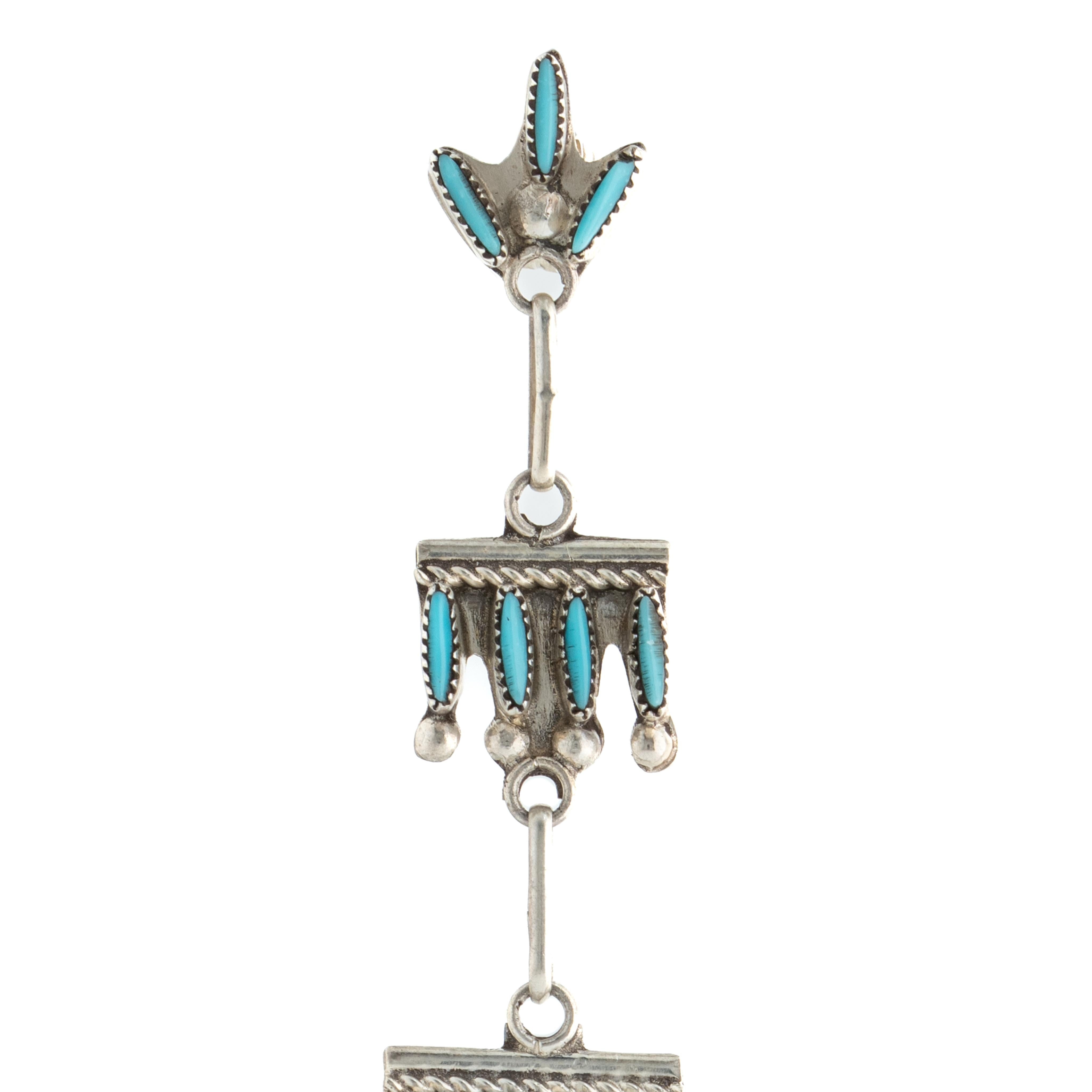 Vintage Zuni Silver and Needlepoint Turquoise Raindrops and Rope Chandelier Earrings c.1970s

Each earring weighs: 5.61 grams
Length: 3.6