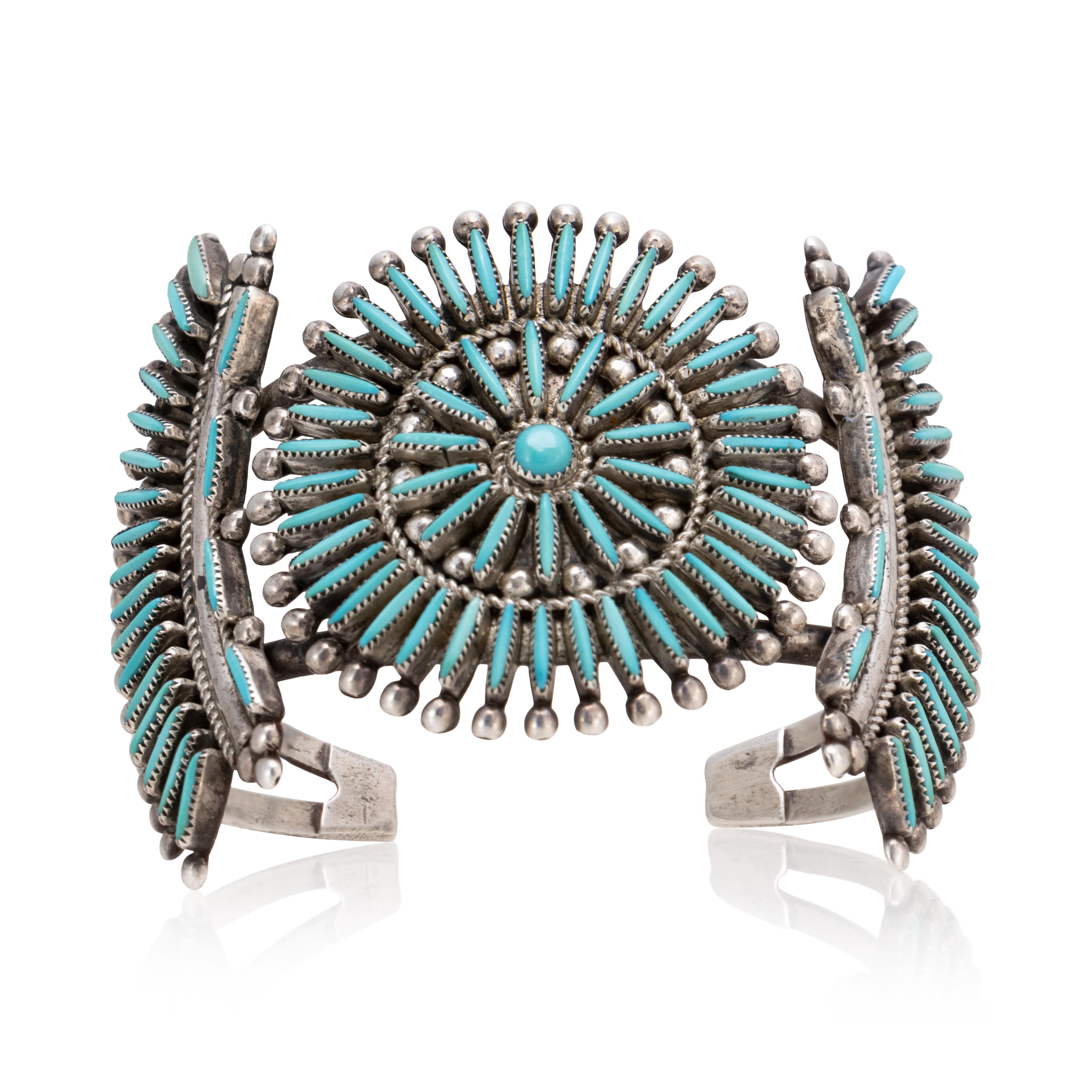 Zuni Sleeping Beauty needlepoint turquoise and sterling cuff bracelet by Lance and Cordelia Waatsa. Flexibility to tighten wrist. It is very common for Zuni husband and wife teams to make jewelry together. Usually, one will do the stone work and the