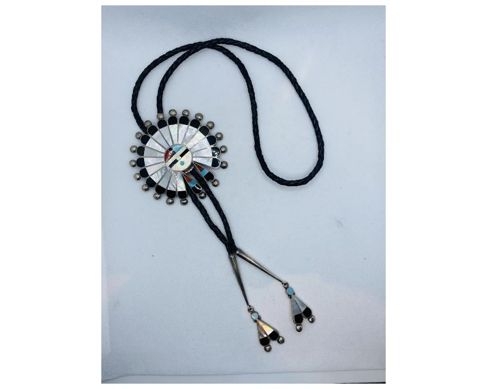 Zuni Sun Face Bolo Tie Native American MYRA TUCSON

Consistent with age and use please see the photos for condition 
Please ask for more photos if you need we will send them with in 24-48 hours

Due to the item's age do not expect items to be in