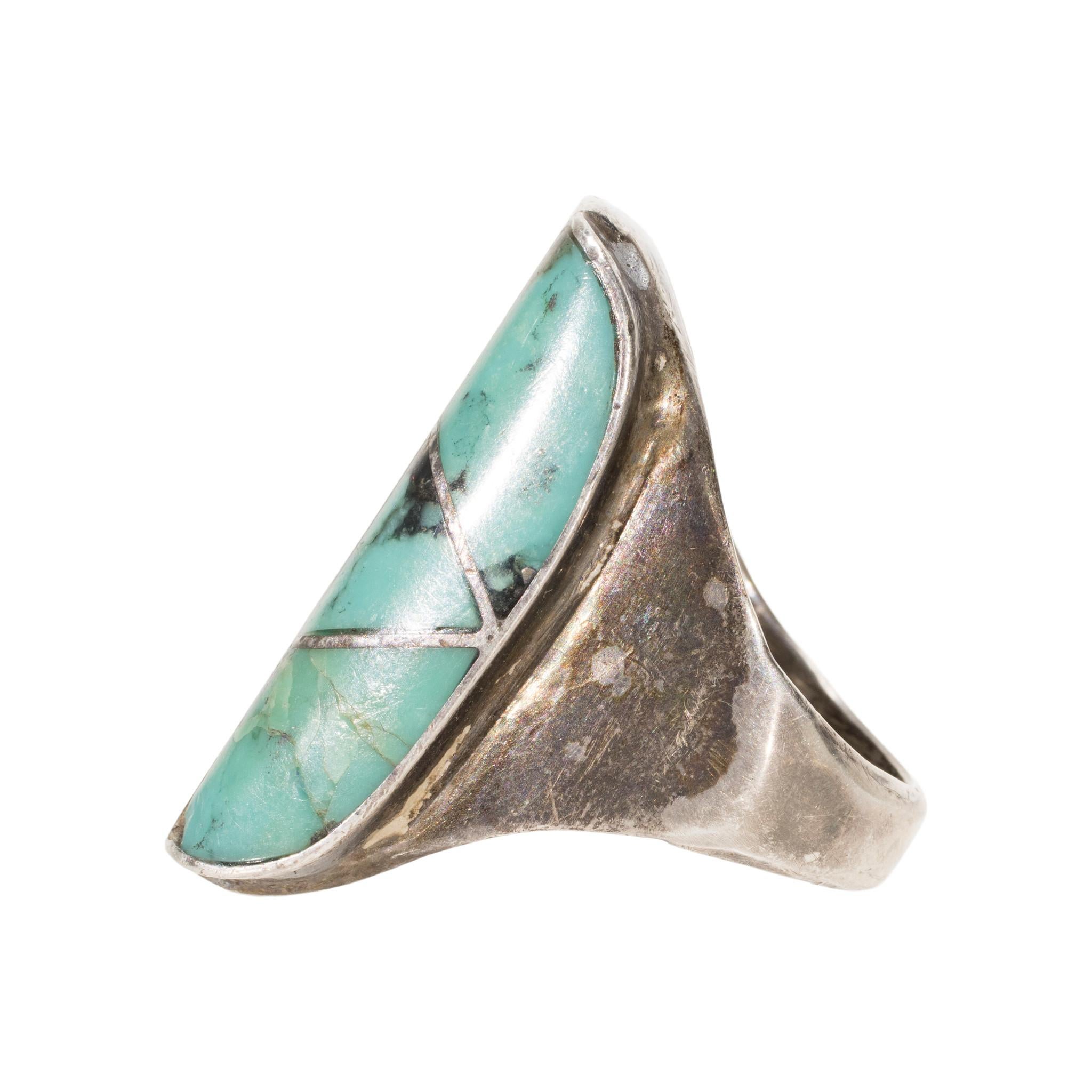 Zuni inlay turquoise and sterling silver ring. Beautiful Kingman turquoise stones inlaid in swirling geometric design, separated by lines of sterling. Marked 