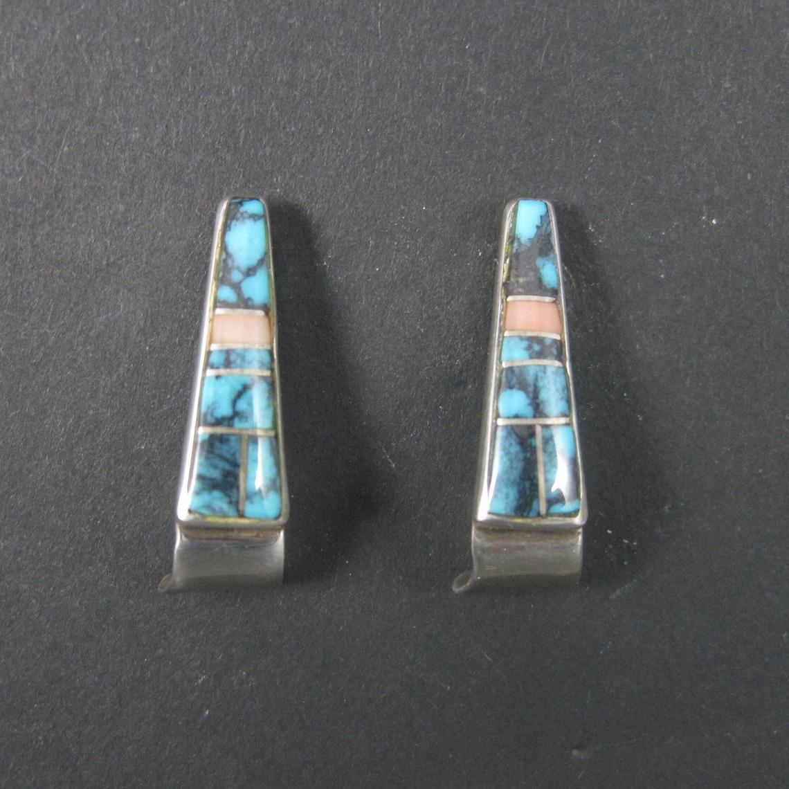These gorgeous vintage earrings are sterling silver.
They feature inlay in turquoise and pink spiny oyster.

Measurements: 1/4 by 15/16 of an inch
Weight: 5.1 grams

Marks: Sterling, ZJ
Though the maker, ZJ is not known, we do know that he/she was a