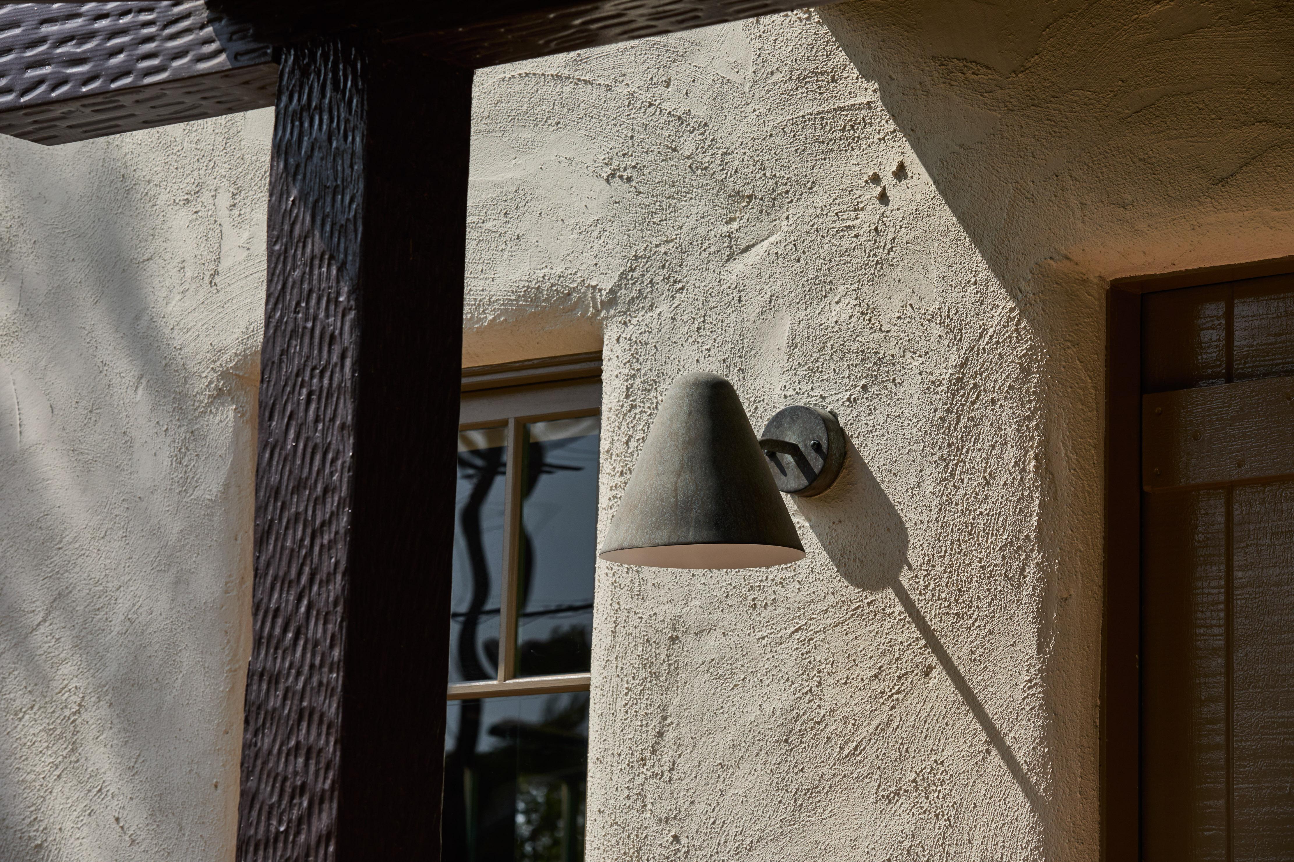 'ZuZu' Darkly Patinated Brass Wall Sconce in the Style of Jacques Biny

An exclusive made for U.S. and UL listed wall sconce reminiscent of the iconic work of  French lighting designer Jacques Biny. Handmade in Los Angeles with meticulous attention