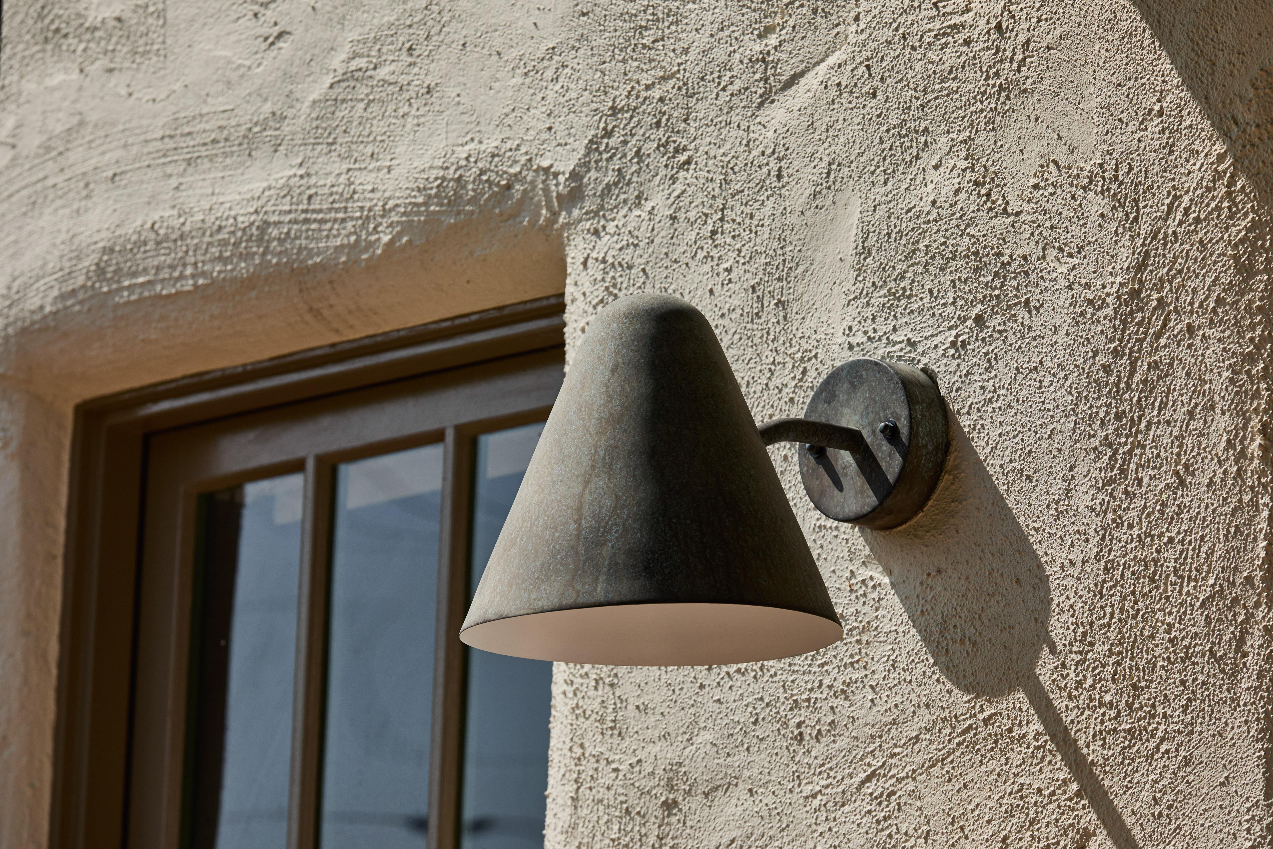 Mid-Century Modern 'ZuZu' Darkly Patinated Brass Wall Sconce in the Style of Jacques Biny For Sale