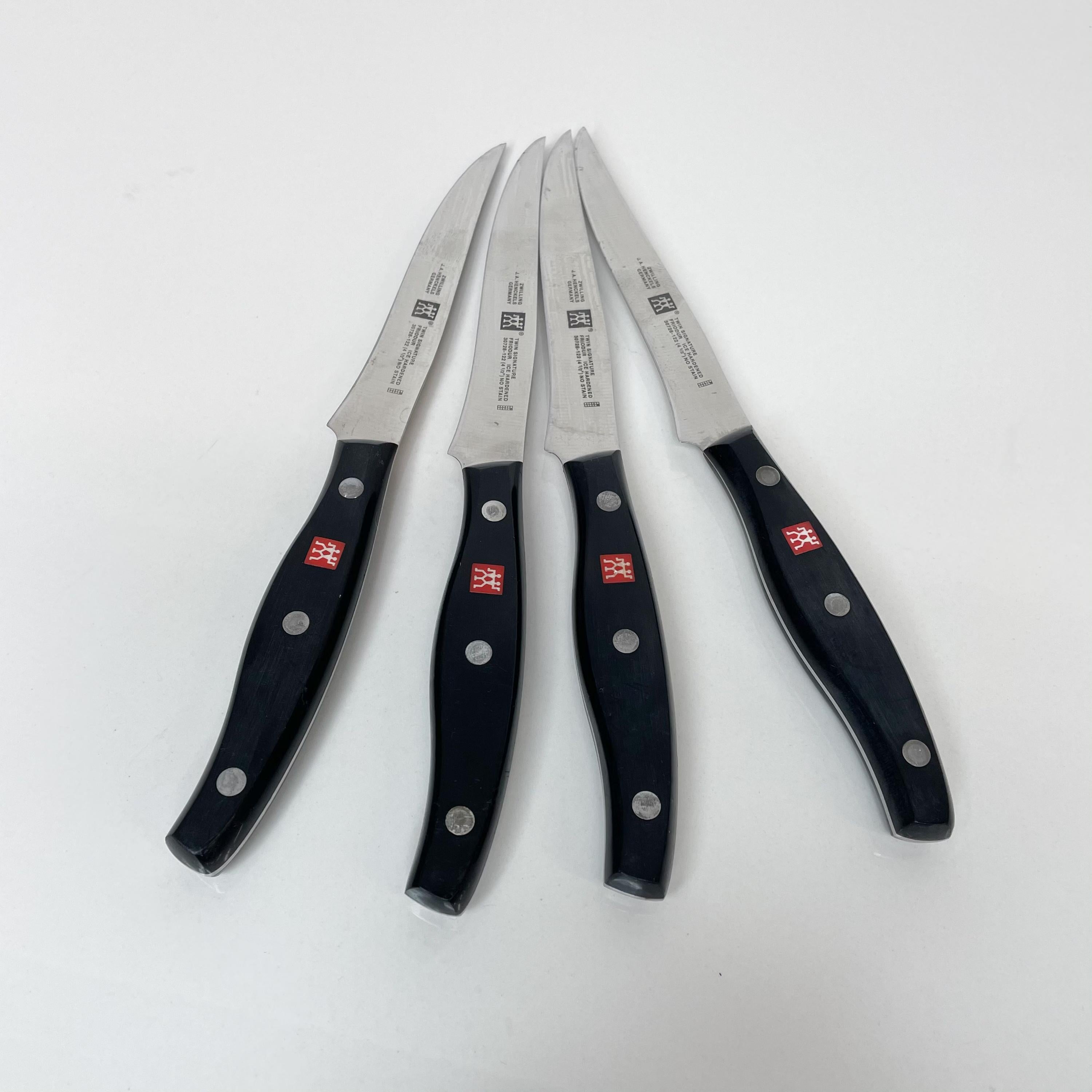 Vintage Set of 6 assorted Knives by Zwilling J A Henckles  Germany
Black Handles
Made in Germany. Maker Stamped.
4 knives at 9.13 L x .63 thick x 1 h
1 serrated knife at 4.25  
1 small knife at 4.13.
Original unrestored vintage preowned