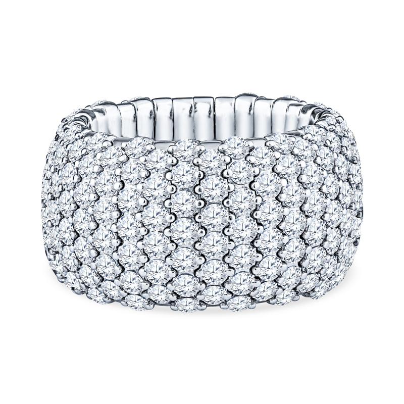 A unique and beautiful ring crafted in 18 karat white gold and features 6.32 carat total weight in round diamonds. It easily slips on and off due to the expanding stretch action. It is approximately a size 6.5-7 but can stretch to fit. 
Diamond