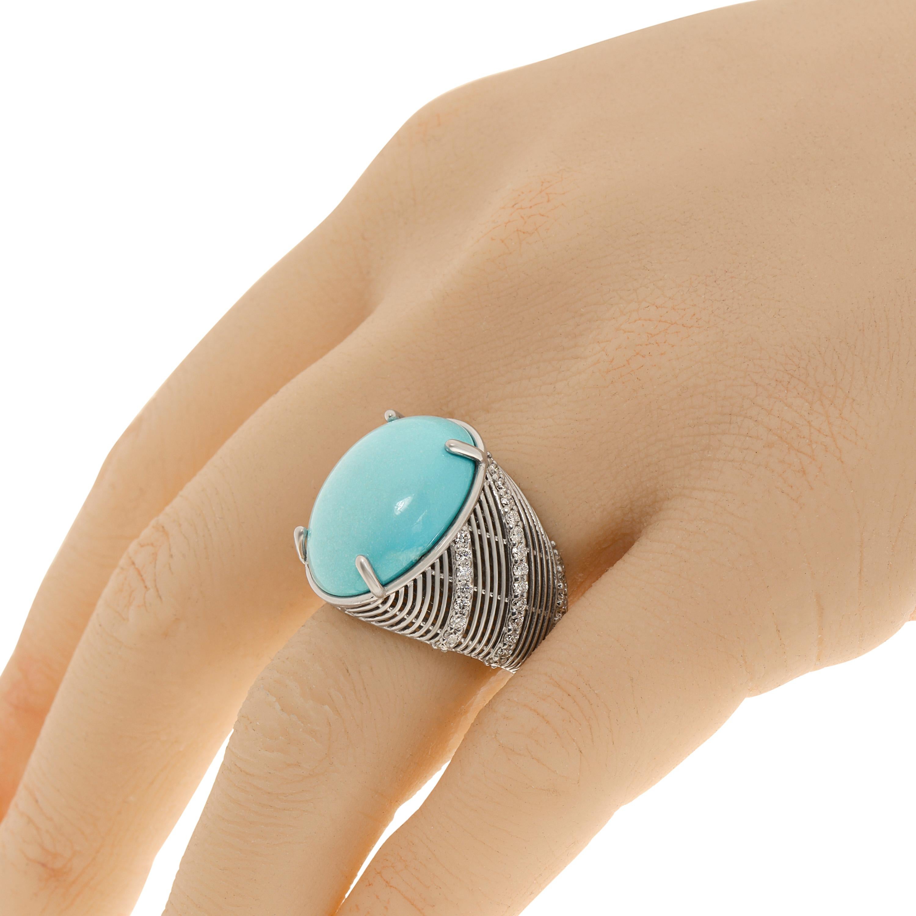 Zydo 18K white gold statement ring features an oversized turquoise gemstone with 0.80ct. tw. diamonds. The ring size is 6.5 (53.1). The decoration size is 7/8
