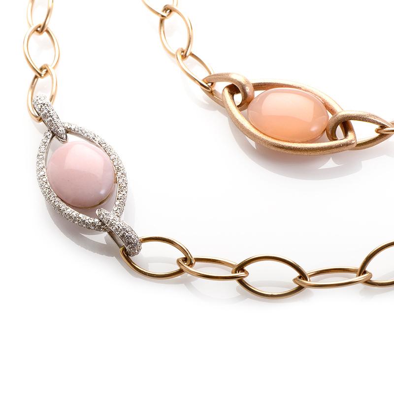 This necklace from Zydo is exceptionally gorgeous and unique. It is made of 18K rose gold and features two pink quartz stones and two moon stones. Lastly, the white gold portion of the necklace is set with ~3.65ct of diamonds.

Approximate